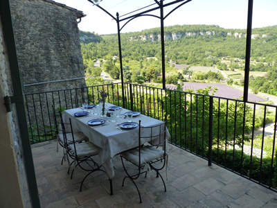 From the living room you enter the terrace through French doors. This is a favourite place for petite dejeuner, al fresco dining or aperitifs. The views of the lavender fields are stunning.